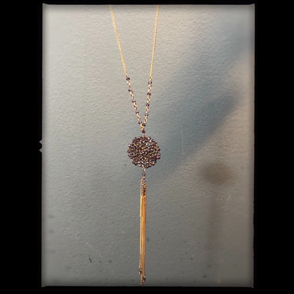 Long gold toned & brown crystal pendant necklace